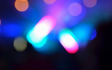 Defocused Image Of Colorful Lights At Night